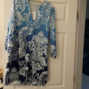 Beach cover up or can dress up .